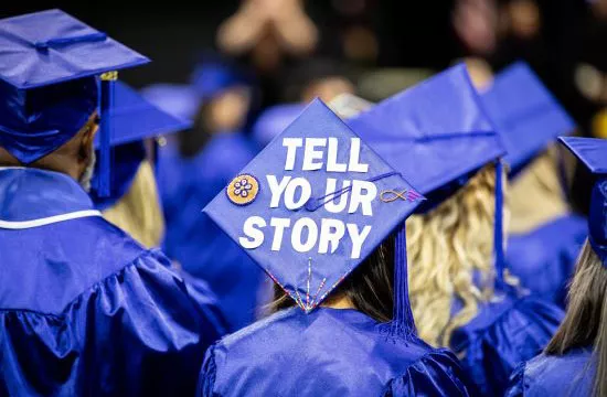photo of a graduate's cap that says "Tell your story."