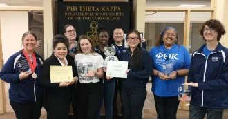 The Madison College Phi Theta Kappa Chapter members pose with their awards