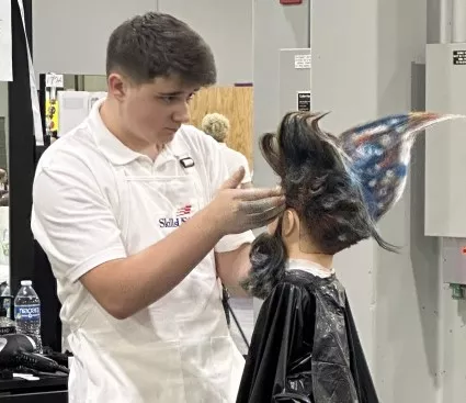 Madison College student shows off their skills at the 2024 Skills USA national competition.