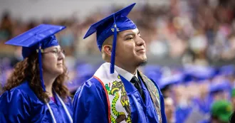 photo: recent Madison College graduate in cap and gown