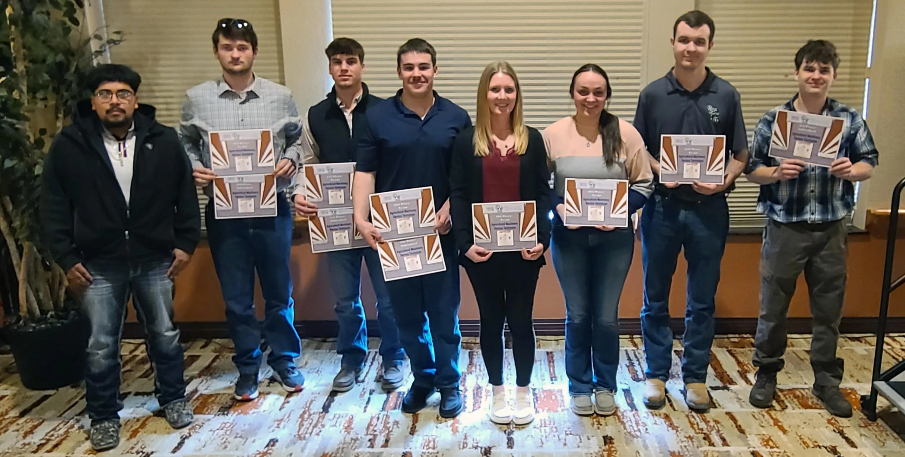 Students photographed with awards after the PAS Club State Competition.