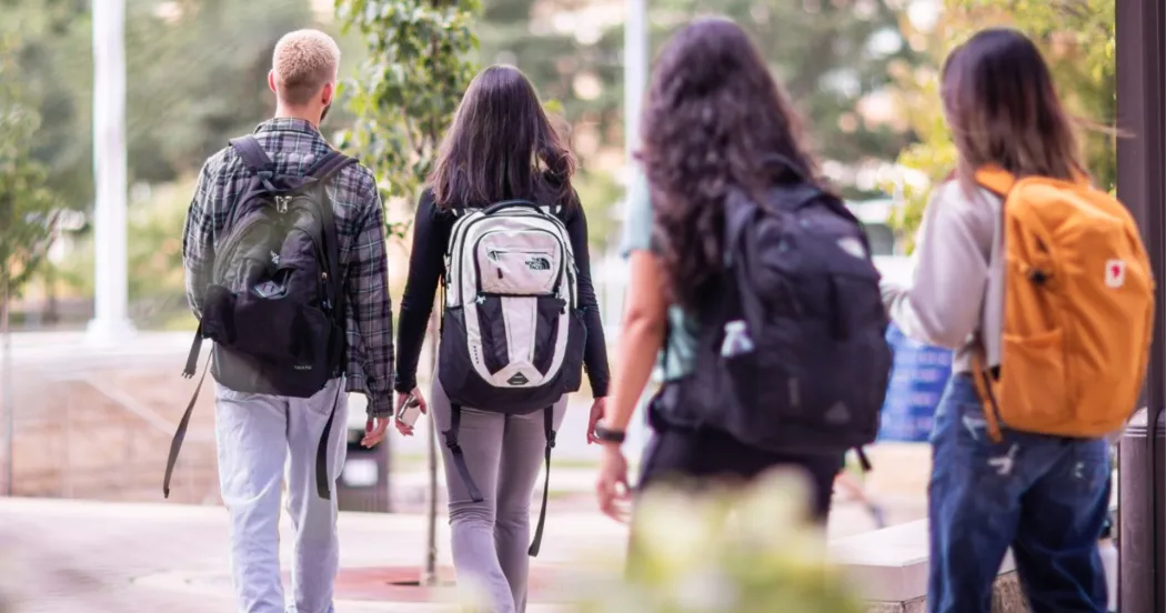 Photo of Madison College students walking on campus. 