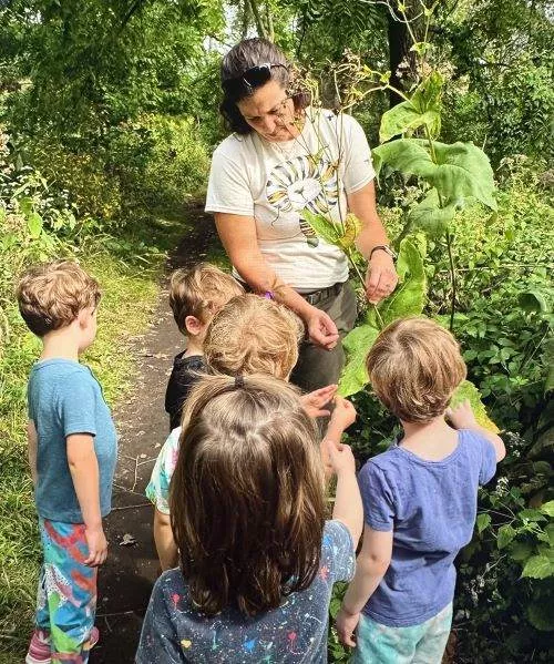 Madison College early childhood educator student Jackie Leys teaches kids about the environment.