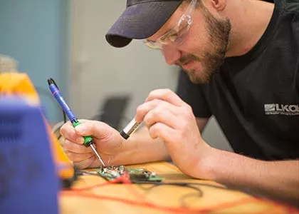 Electronics Soldering Image of Student