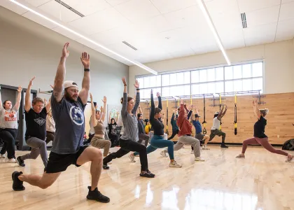 intructor leading a group fitness class at madison college