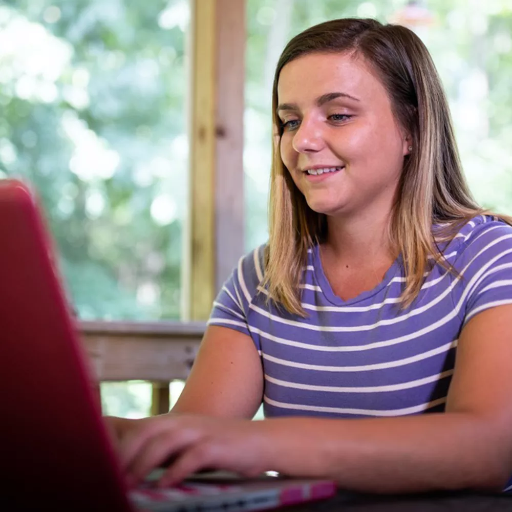 student using laptop