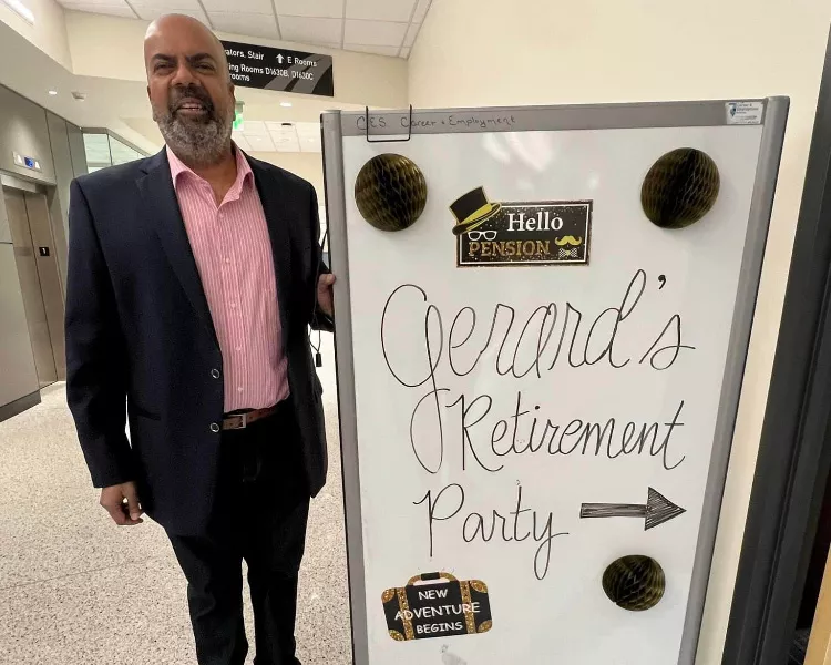 Gerard Xavier and retirement party sign
