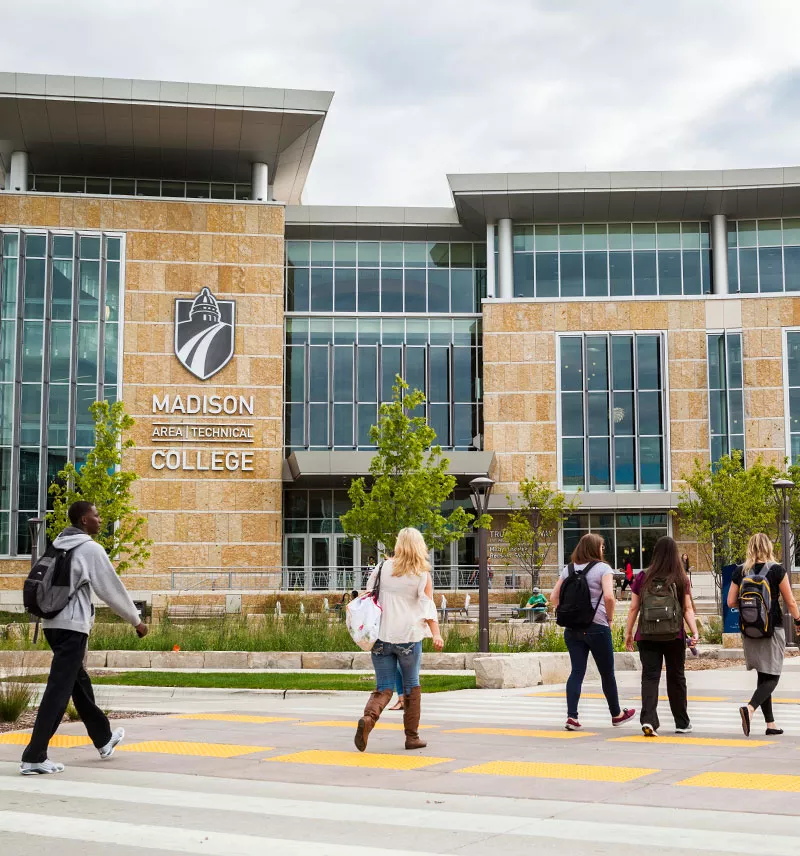 Madison College students walking towards campus