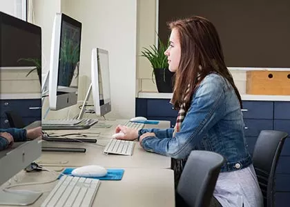 student at a computer