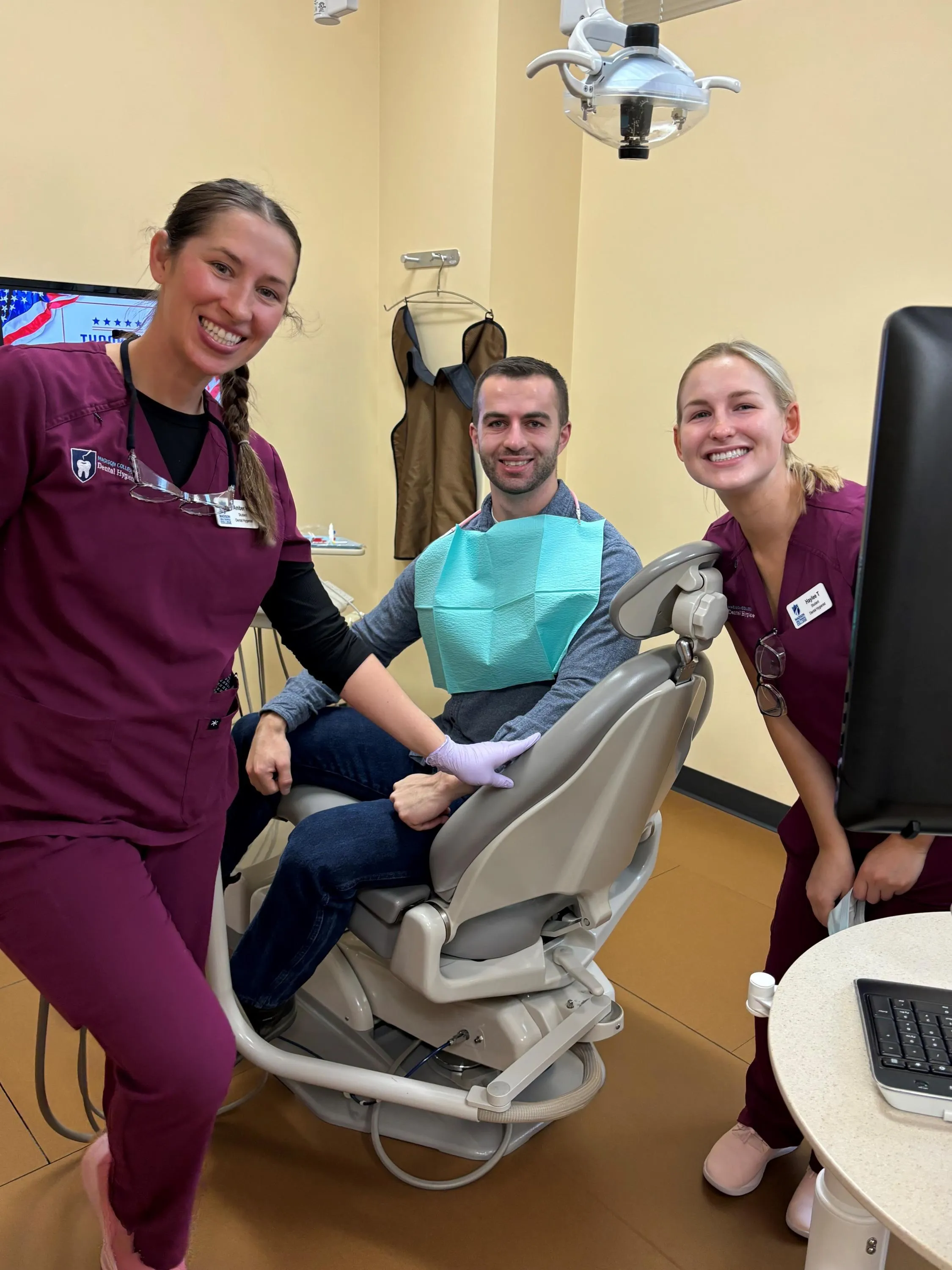 Madison College dental students with patient.