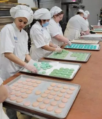 Madison College Baking & Decorative Arts students make cookies.