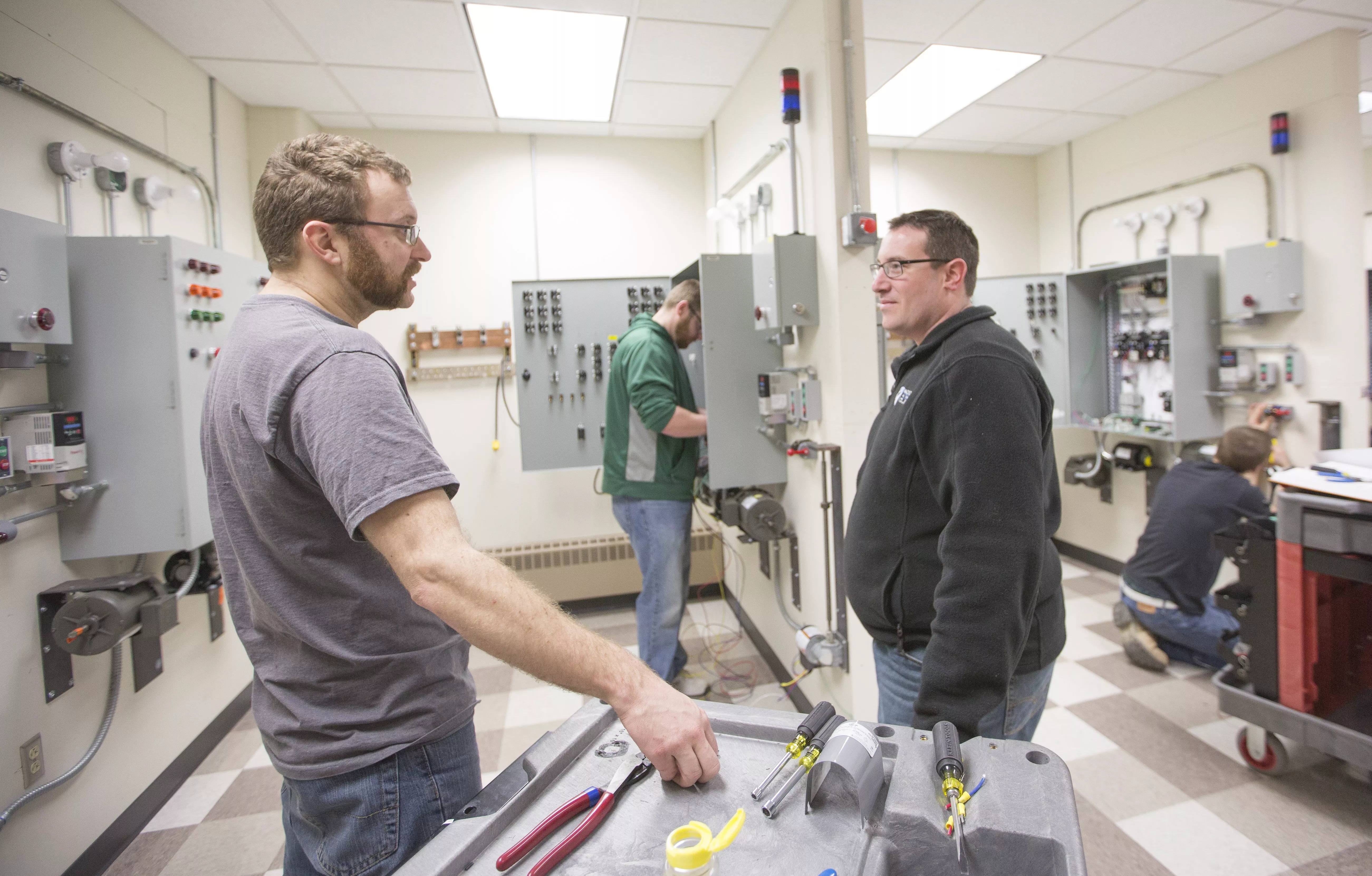Photo of students and faculty in electrician apprenticeship program.