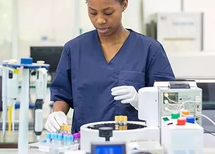 A worker in a medical lab.