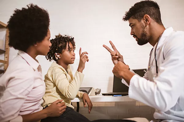 healthcare interpreter communicating with patients