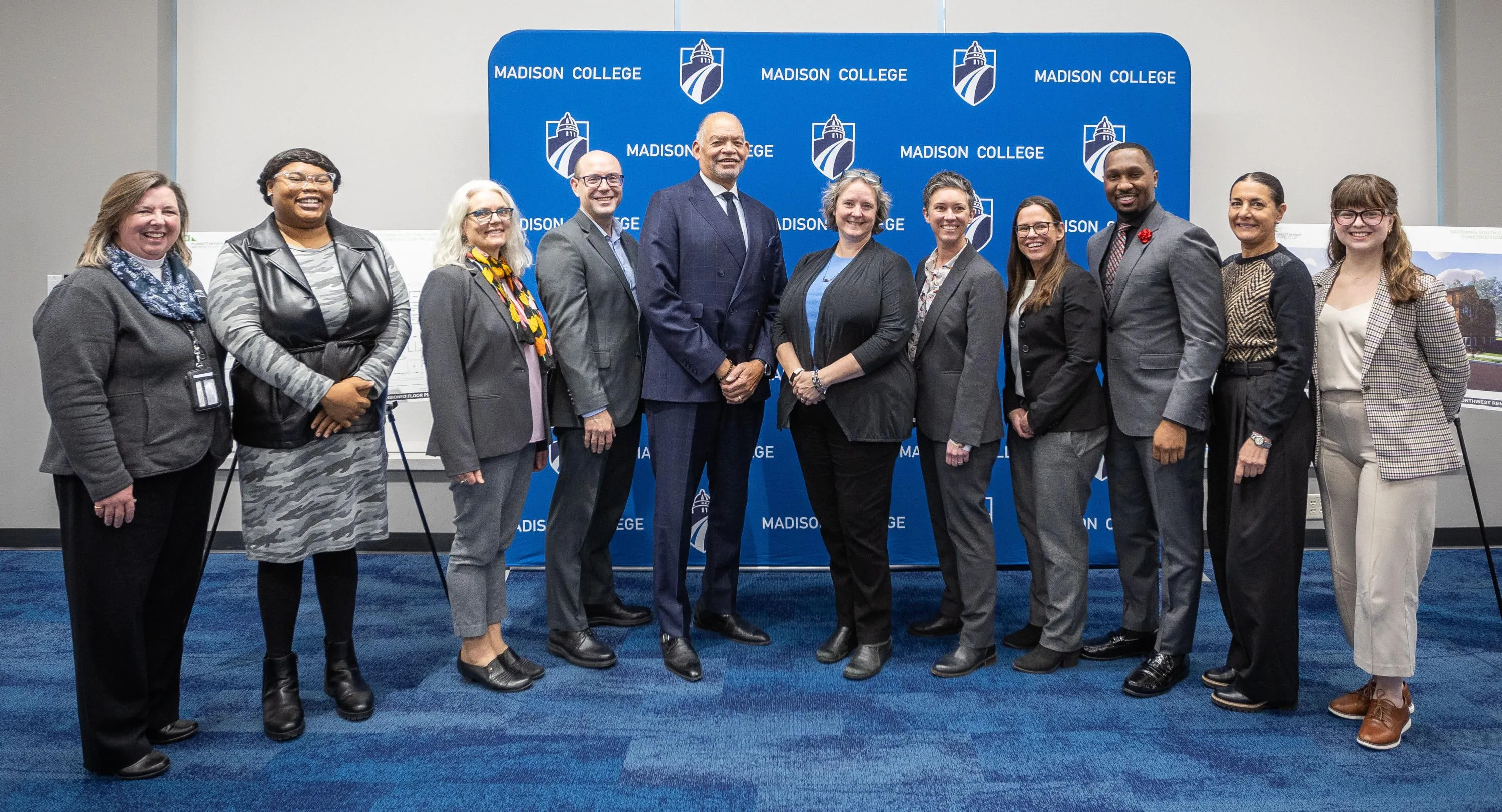 President Daniels poses with local leaders and partners during the Dec. 10 Goodman South campus event.
