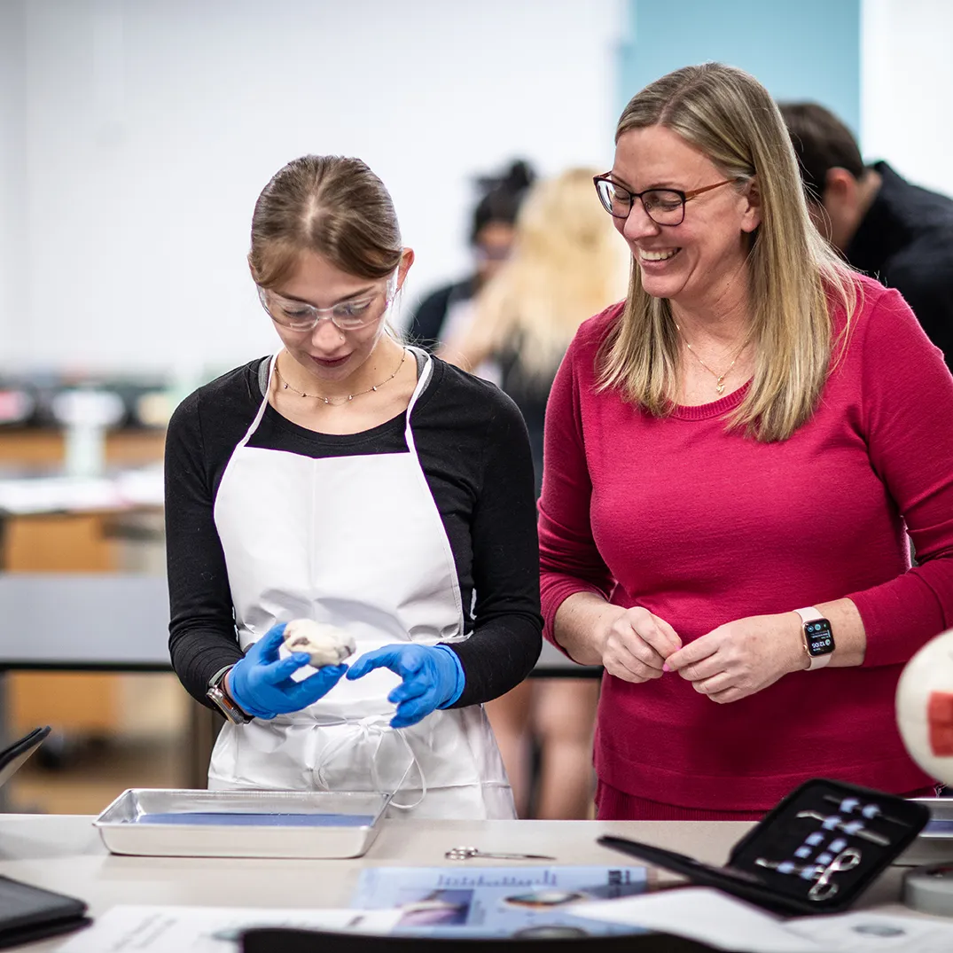 Faculty member and student in lab