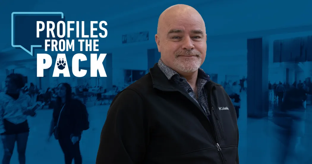 Photo of John Flannery with the Profiles from the Pack logo in the background.