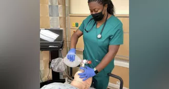 Madison College student learning about respiratory techniques