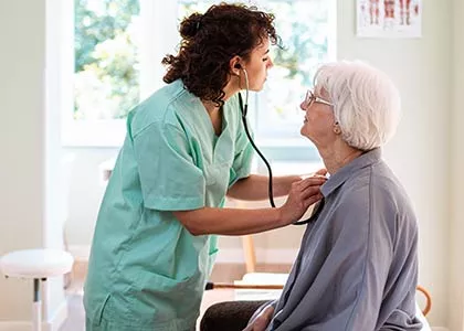 Respiratory Therapist checking lungs of patient