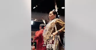 Dancer at pow wow event.