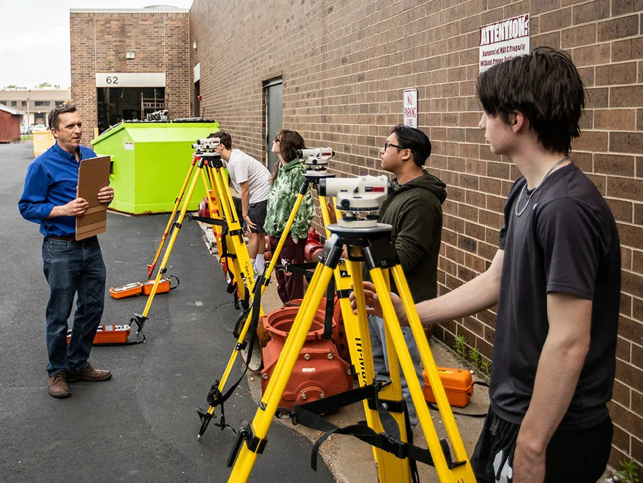 stem academy students with engineering equipment