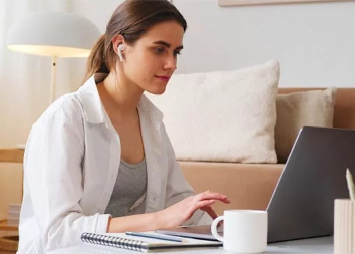 student with a laptop