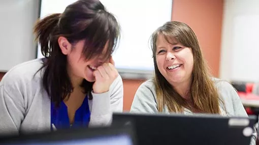 students working and laughing