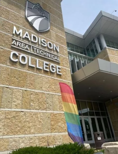 A Pride flag outside the entrance of the Madison College Truax campus.
