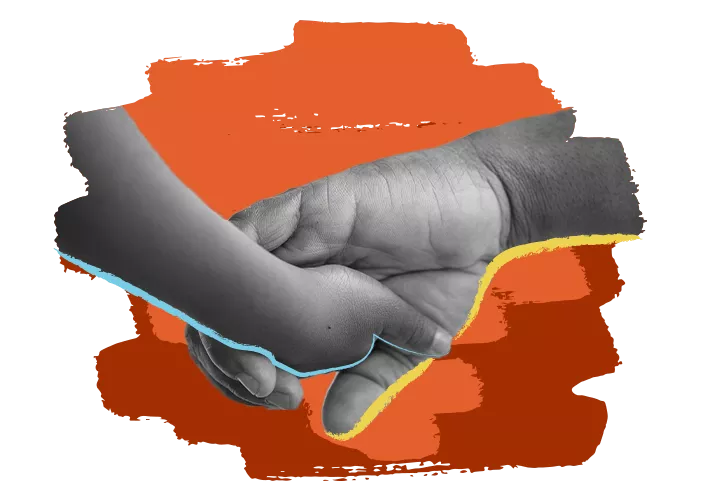 child's hand holding adult's hand