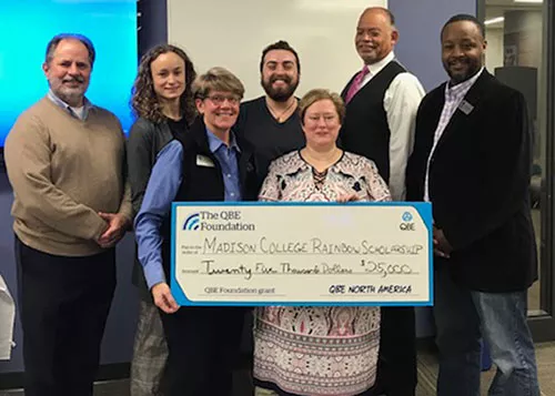 Rainbow scholarship check presentation ceremony photo