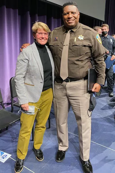 Dr. Bakken with Dane County Sheriff Kalvin Barrett