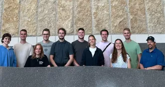 Photo of German apprentices in the Gateway of the Madison College Truax campus.