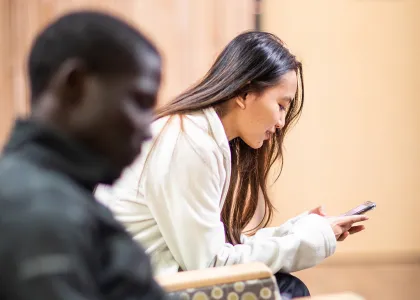 web design student testing user expierence on cell phone