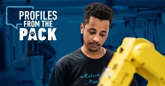 Student Yonatan Abichu with the Profiles from the Pack logo.